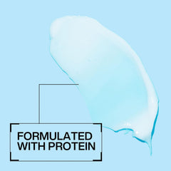 Redken Extreme Conditioner ingredient label highlighting Strength Complex benefits