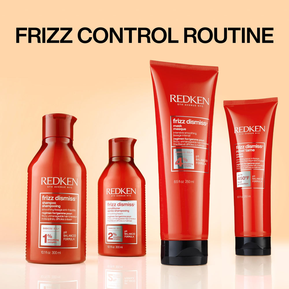 Redken applying conditioner to wet hair demonstrating frizz control benefit