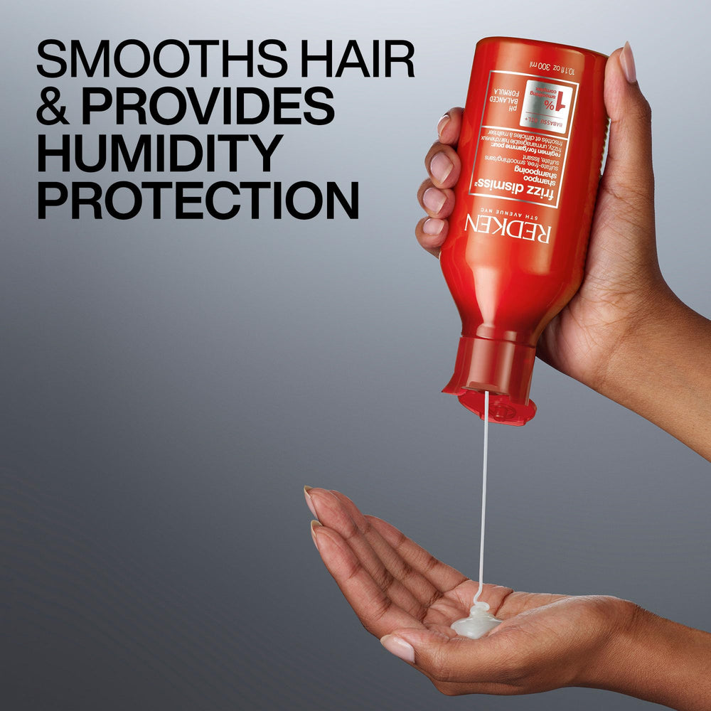 Redken in-shower use showing shampoo rinse for manageable hair results