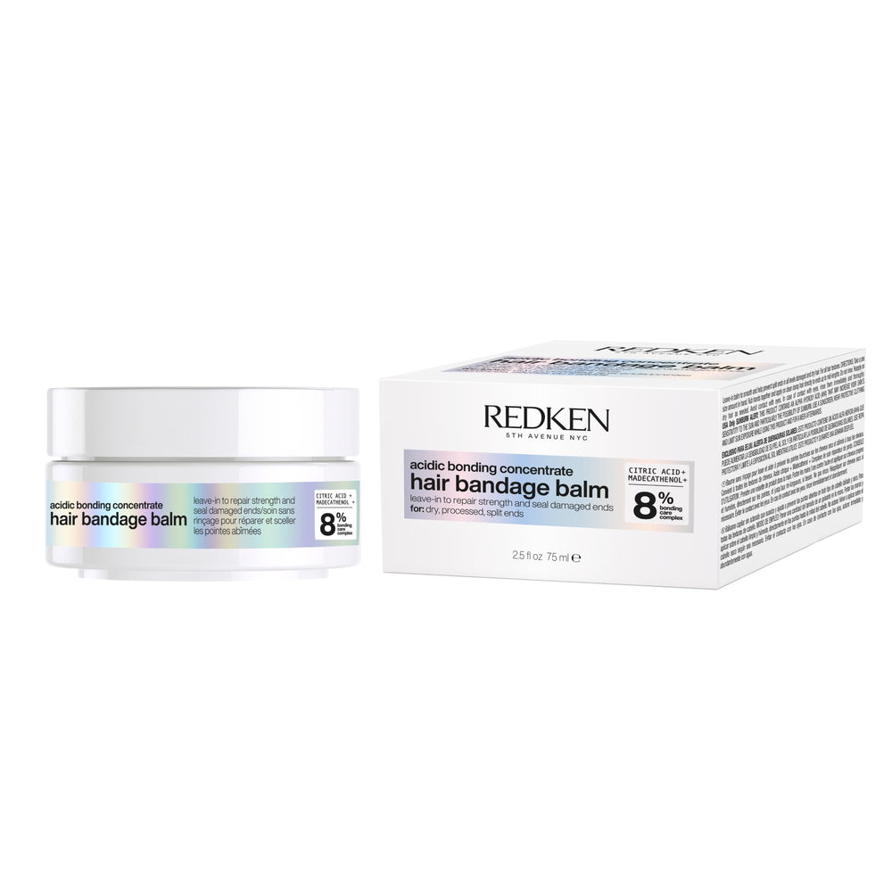 Redken bottle front view showing repair balm and quick visual benefit