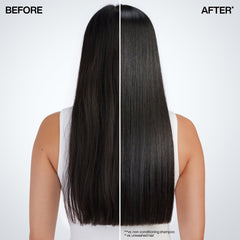 Hand applying Redken mask to towel-dried hair for a quick one-minute treatment