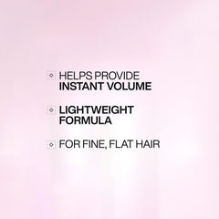 Redken dispensing conditioner pump demonstrating easy salon-style use