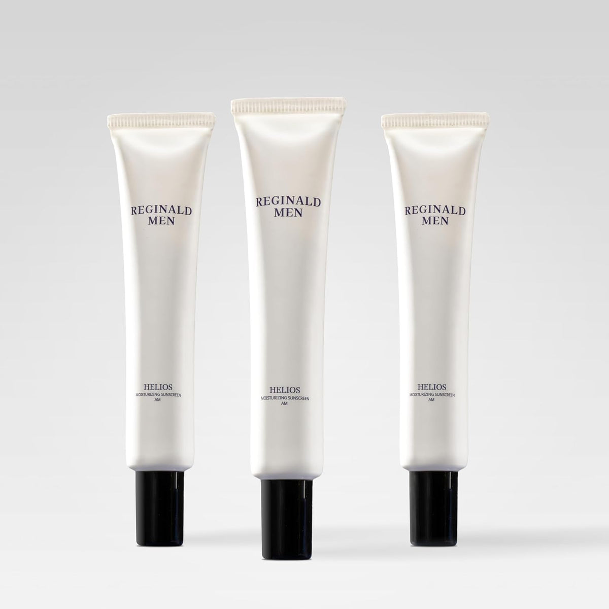 Reginald Men front packaging showing SPF 50+ protection and pack of three benefit