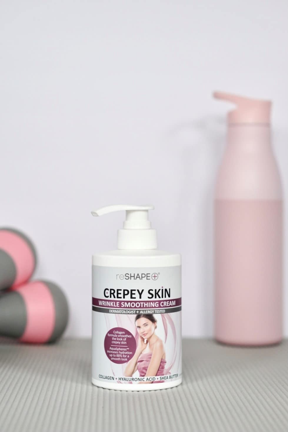 Reshape+ on a bathroom shelf with towel, lifestyle shot highlighting daily routine convenience
