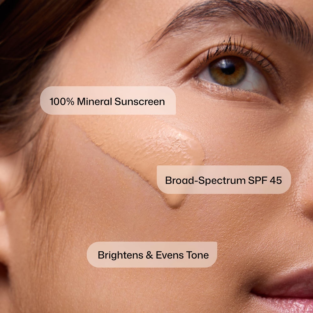 Revision Skincare tinted swatch on skin demonstrating natural coverage and glow