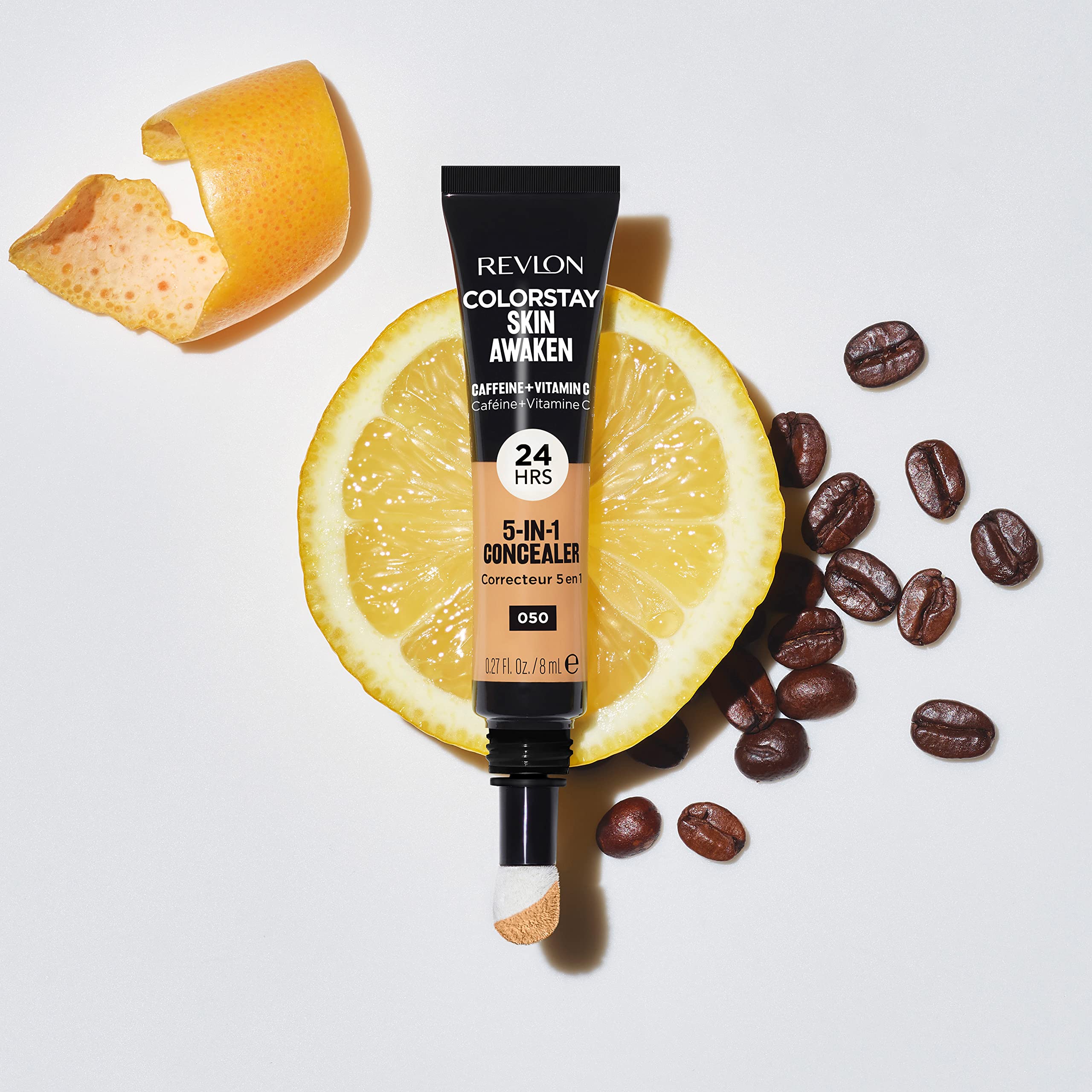 Revlon ColorStay next to a coin showing compact 0.27 fl oz travel-friendly size benefit