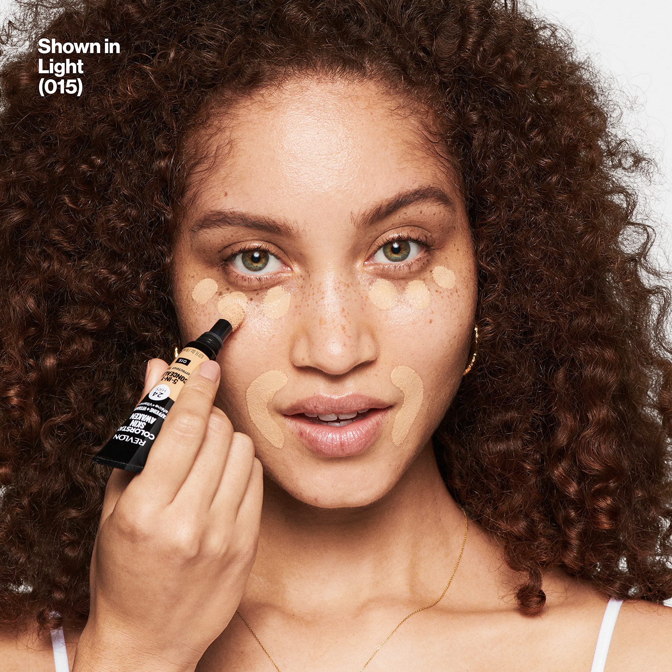 Revlon concealer applied under-eye for brighter, less puffy look