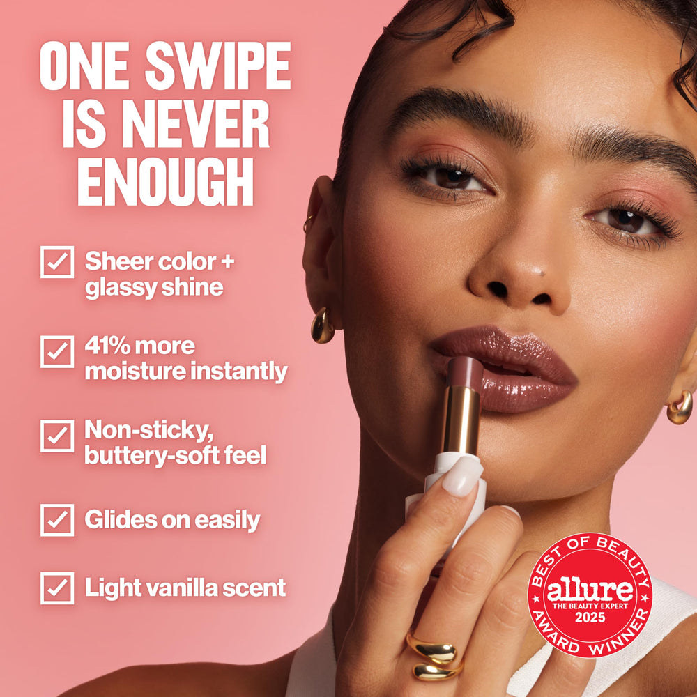 REVLON swatch on hand showing sheer pink tint and luminous shine benefit