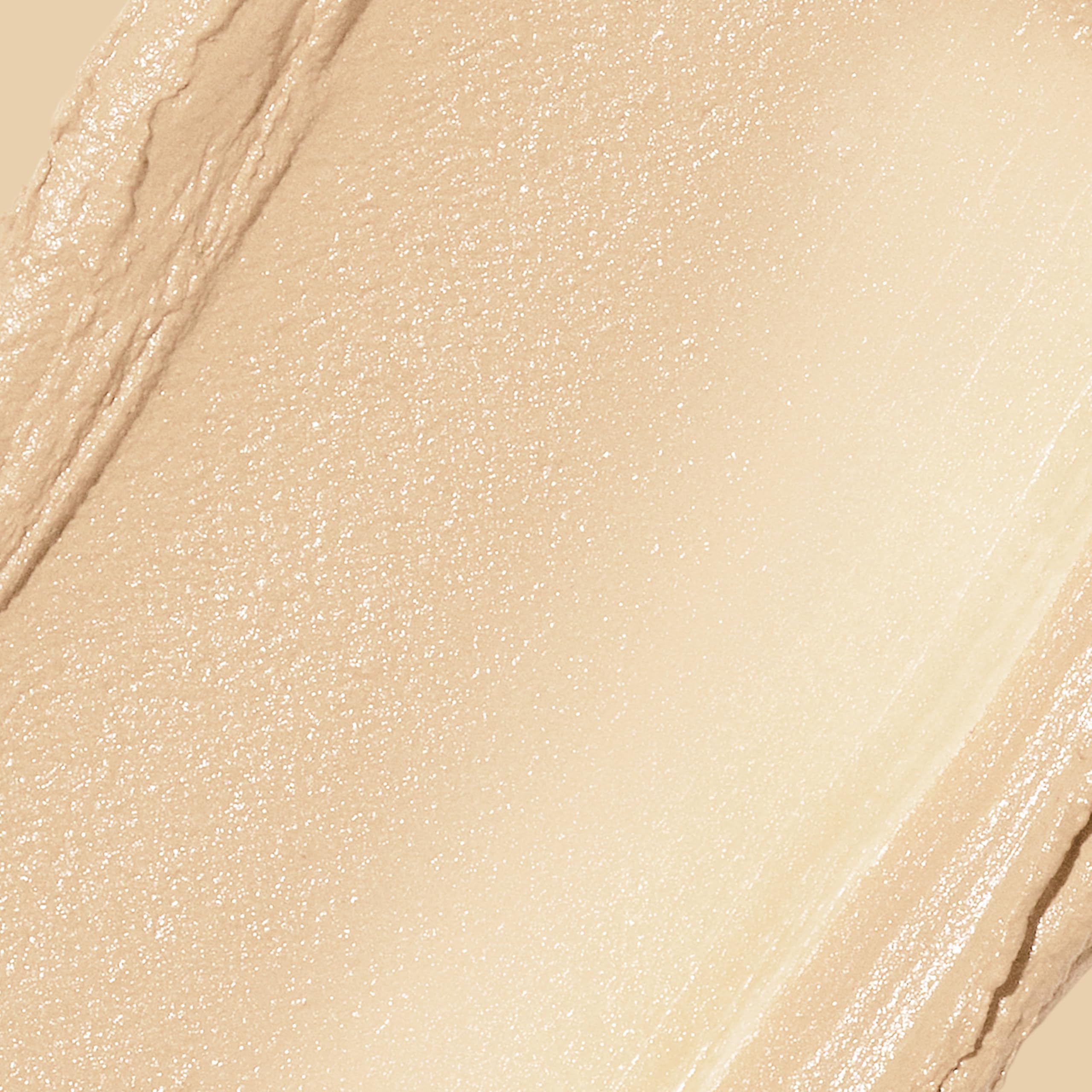 Revlon Glimmer stick open showing creamy texture and smooth glide benefit