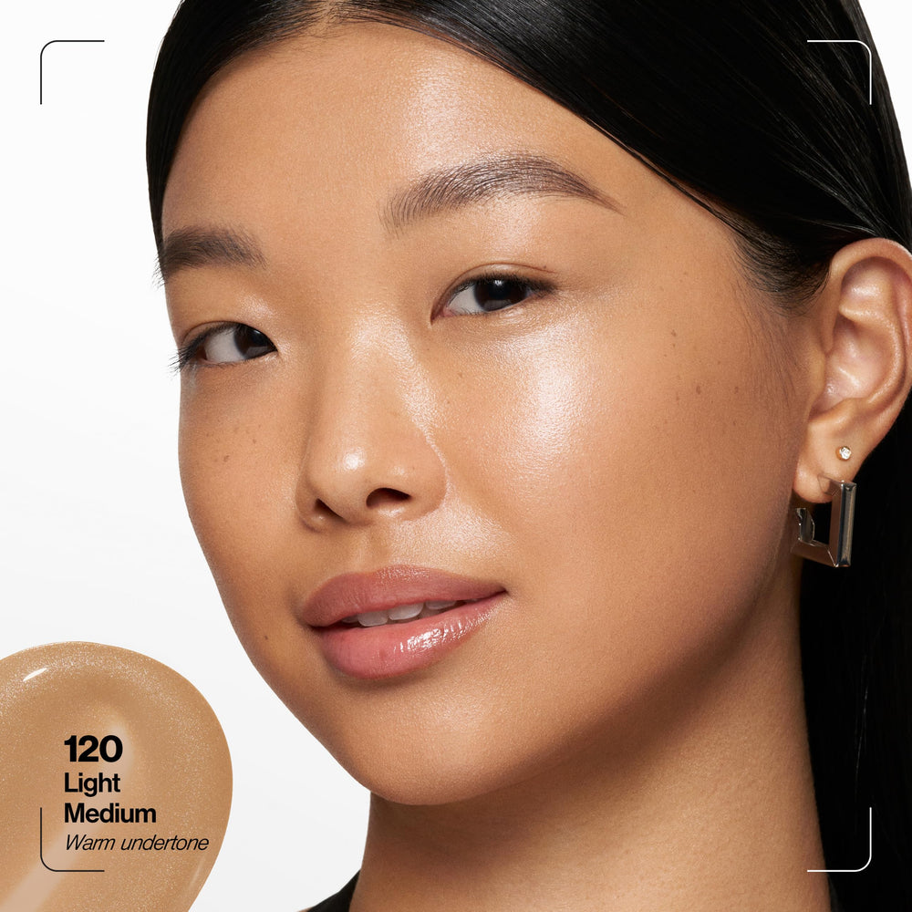 Revlon droplet on hand showing lightweight, hydrating skin benefit