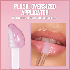 REVLON lip oil layered over matte lipstick adding glossy dimension