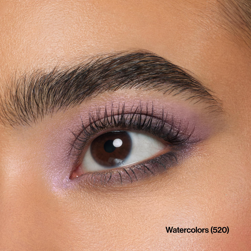 REVLON double‑ended applicator shown applying shadow for precise placement and blending
