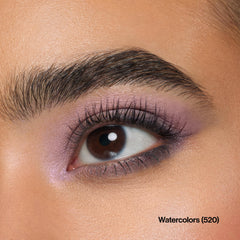 REVLON double‑ended applicator shown applying shadow for precise placement and blending
