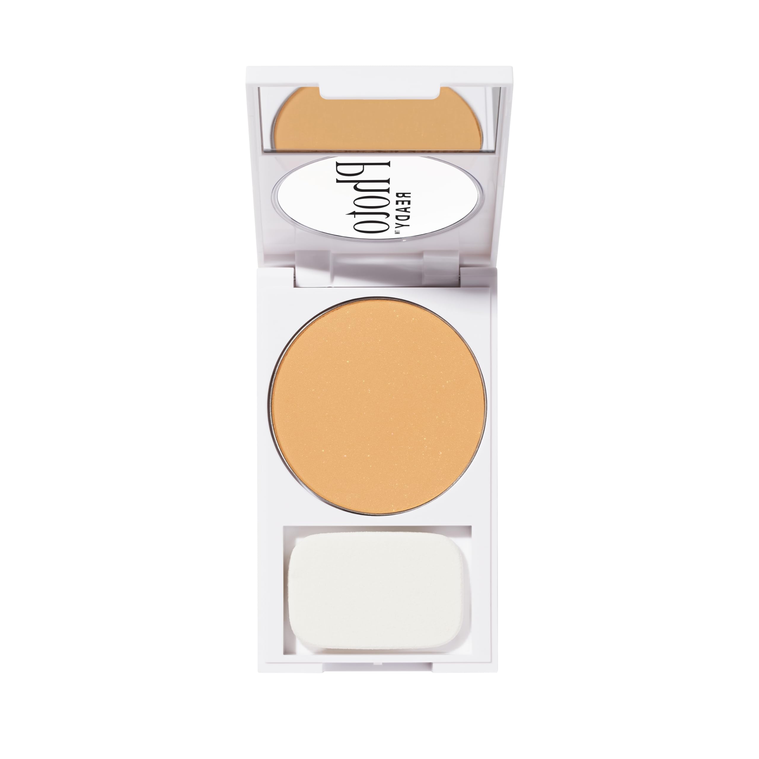 Revlon compact next to hand to show size with brush for on-the-go touch-ups
