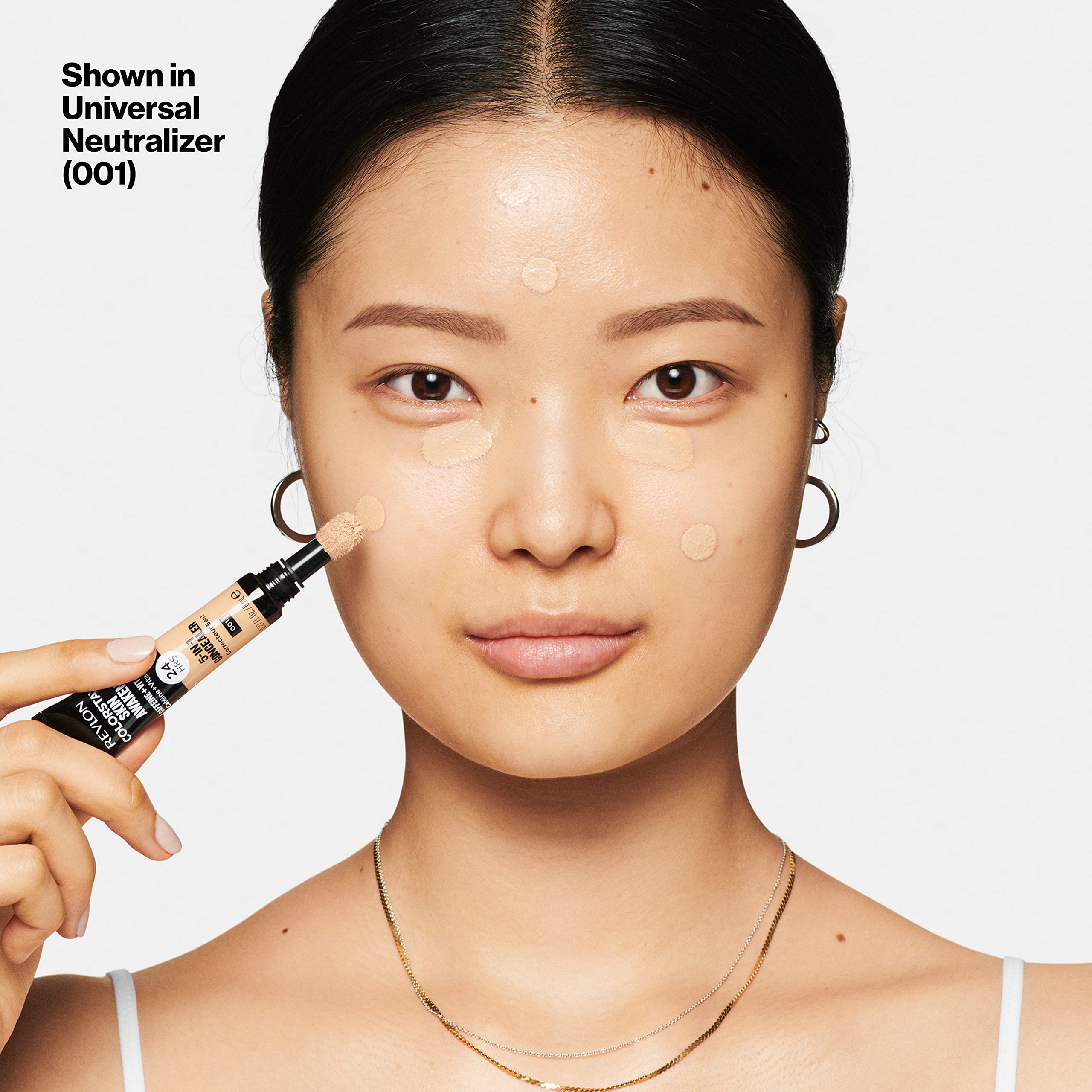 Revlon side label with ingredients list highlighting caffeine and vitamin C benefits