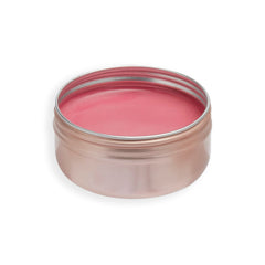 Revolution Balm Glow blended on cheeks demonstrating buildable dewy color