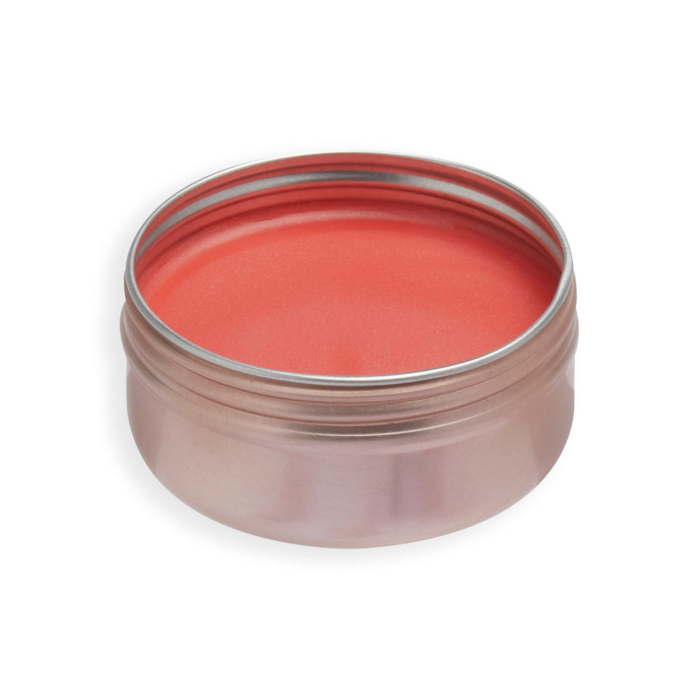 Revolution Balm Glow on model cheeks demonstrating Peach Bliss dewy natural flush