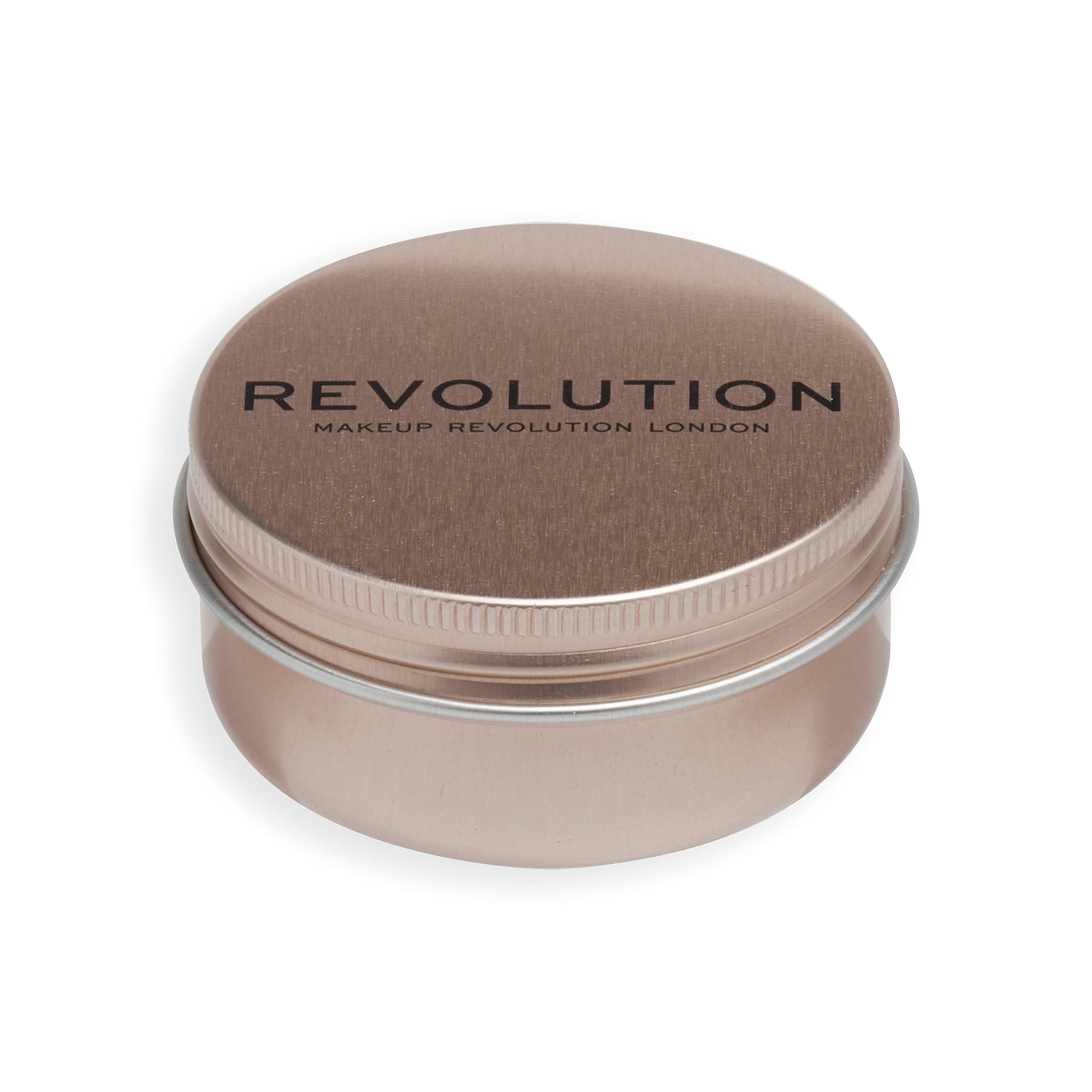 Revolution Balm Glow size shown in hand for travel-friendly convenience