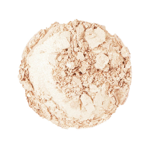 Revolution Beauty open pan of Diamond Glow displaying icy silver reflective finish