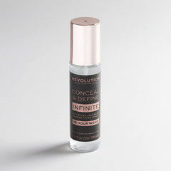 Revolution Beauty Infinite Fixing Spray applied on model in lifestyle setting for longwear makeup benefit