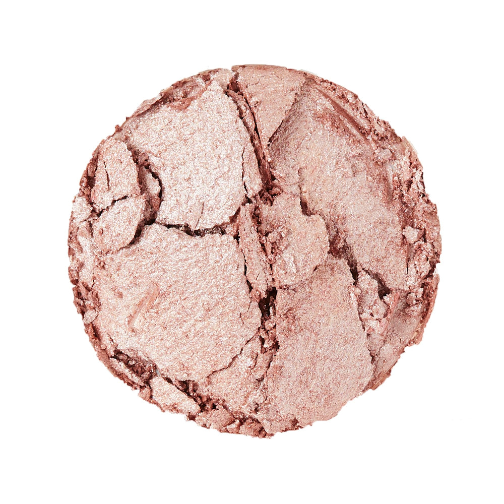 Revolution Beauty London open pan showing creamy powder-to-liquid texture for seamless glow