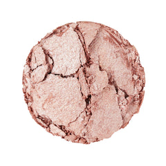 Revolution Beauty London open pan showing creamy powder-to-liquid texture for seamless glow