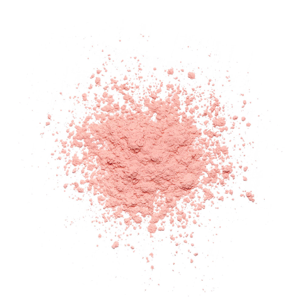 Revolution Beauty London close-up of finely milled Rose powder texture for smooth finish