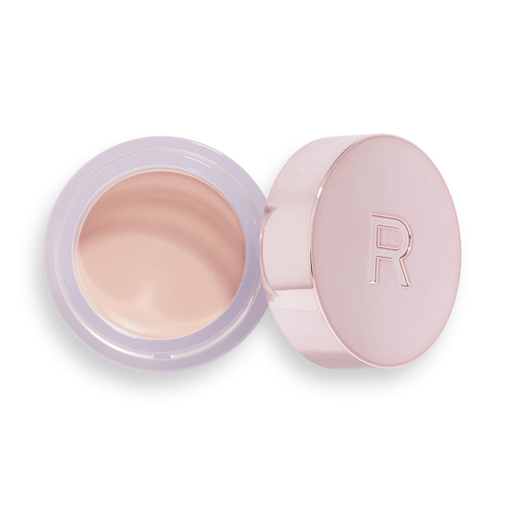 Revolution Beauty London product beside coin to show compact size and travel-friendly convenience