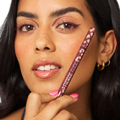 Revolution Fierce Flick on model wearing bold winged eyeliner showing long-wear benefit