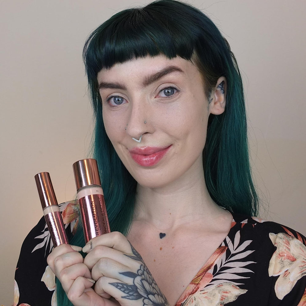 Revolution Beauty London foundation bottle in hand to show product scale