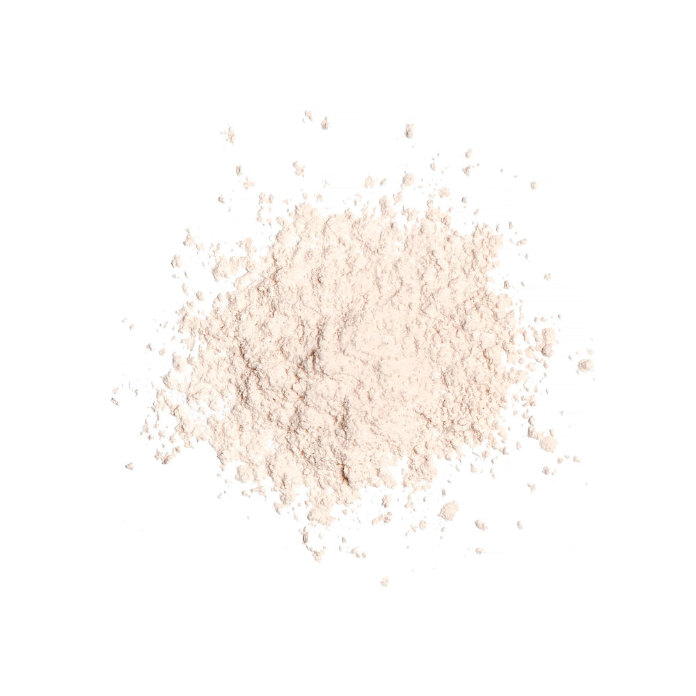 Revolution Beauty London open jar with powder in lid illustrating mess-free dispensing and controlled use