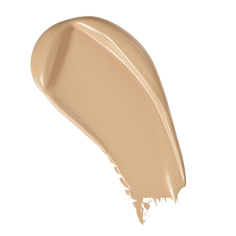 Revolution foundation applied on hand with brush, demonstrates buildable coverage