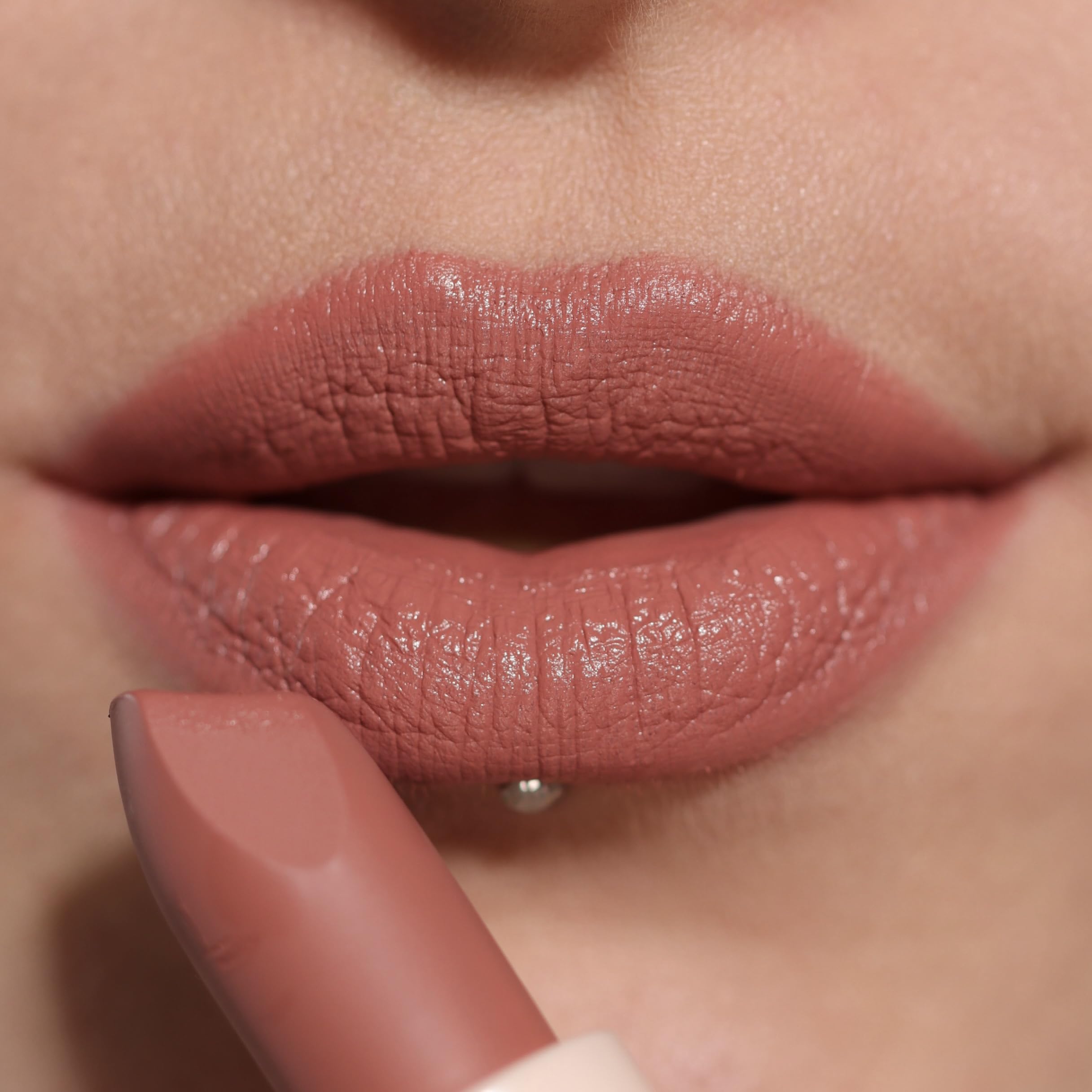 Revolution Beauty London model wearing Wifey dusky pink showcasing wearable everyday satin finish