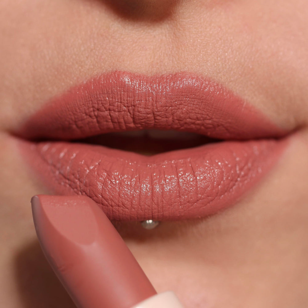 Revolution Beauty London model wearing Wifey dusky pink showcasing wearable everyday satin finish