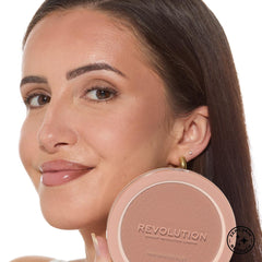 Revolution Mega Bronzer packaging with lid open highlighting pan size and product labeling