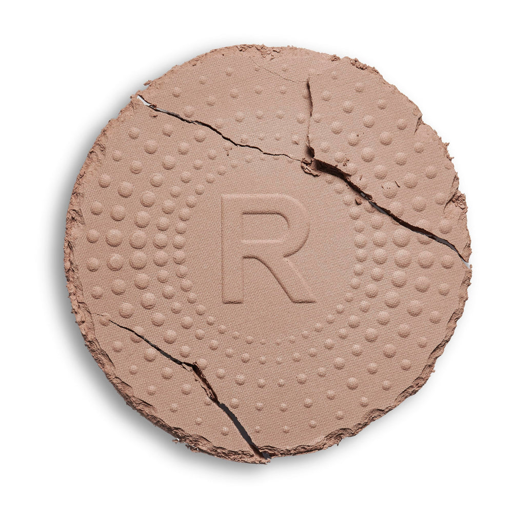 Revolution Mega Bronzer powder close-up texture showing smooth matte finish that blends evenly