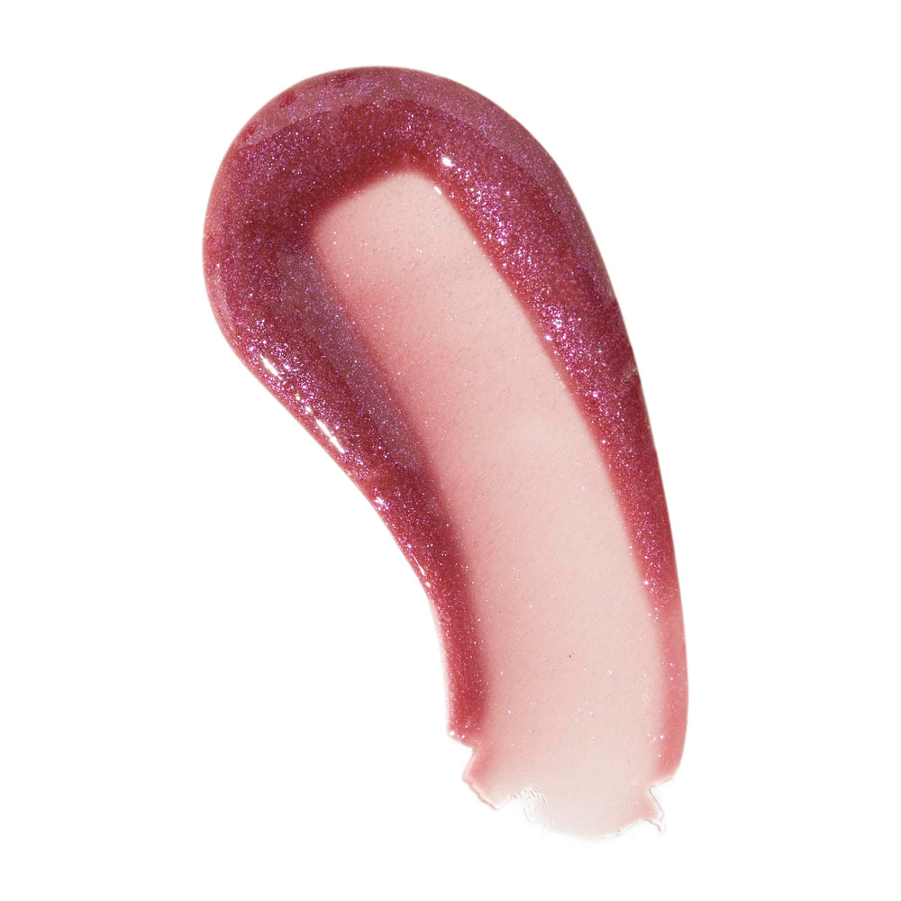 Revolution Pout Bomb doe-foot applicator with glossy texture for easy one-swipe application