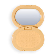 Revolution Powder Pops front compact in Banana Deep shows neat packaging and easy portability