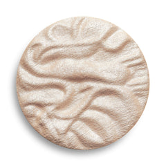 Revolution Beauty London highlighter styled in makeup bag showing everyday glam benefit