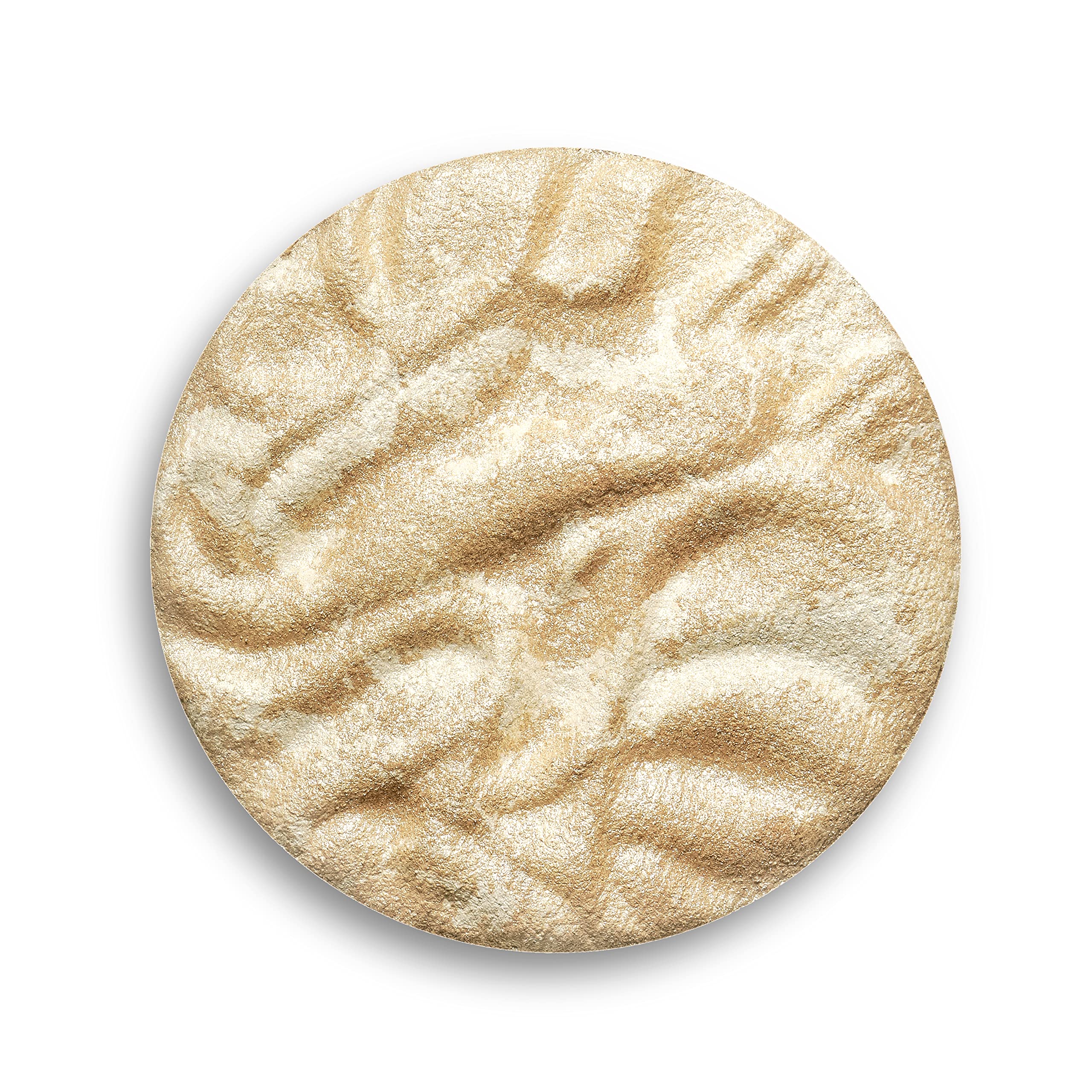 Revolution Beauty London highlighter in a makeup bag for on-the-go radiance