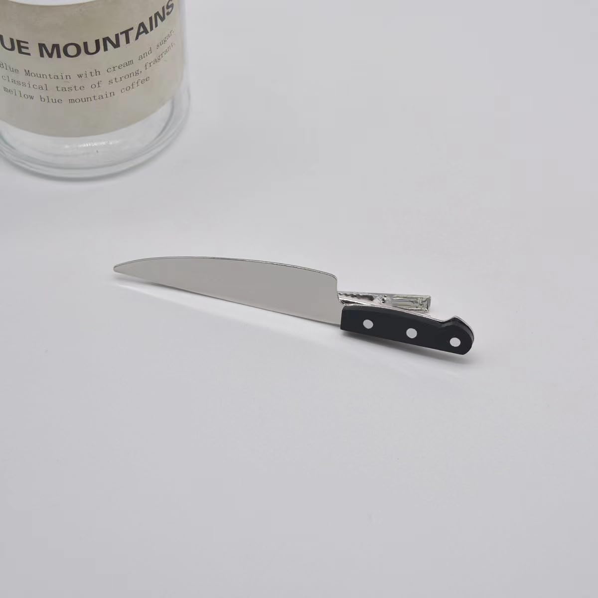 RFTWXHPN size comparison beside ruler shows 2.6-inch compact scale