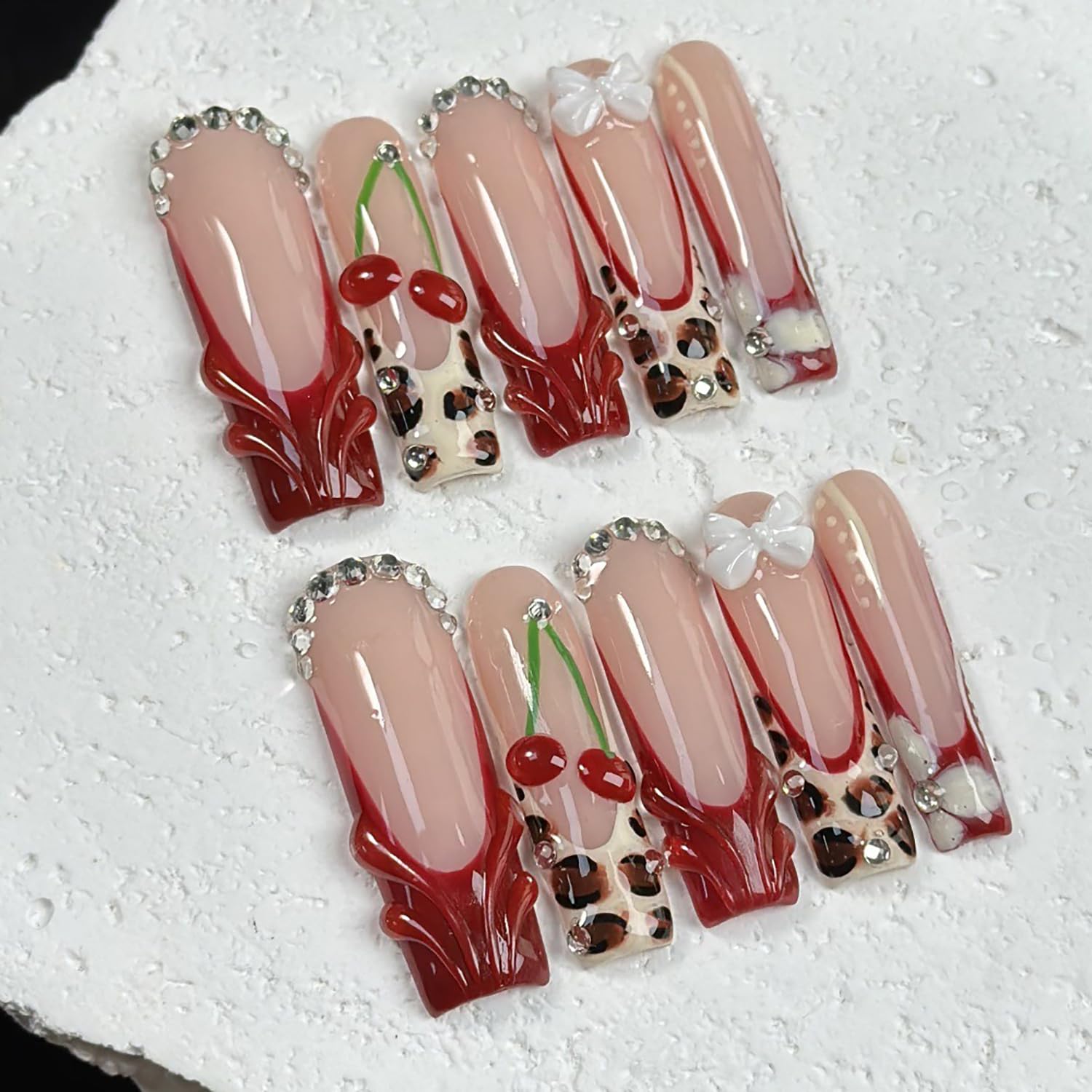 RIICFDD nails on model hand demonstrating finished look for event-ready style