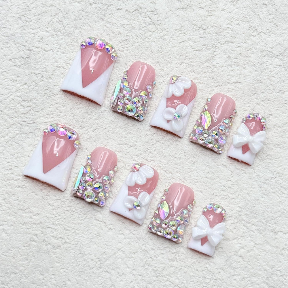 RIICFDD hand applying press-on nail using included tools benefit: quick five-minute manicure