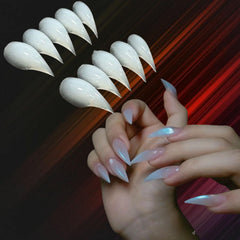 RIICFDD short stiletto extensions in use demonstrating precise sculpting