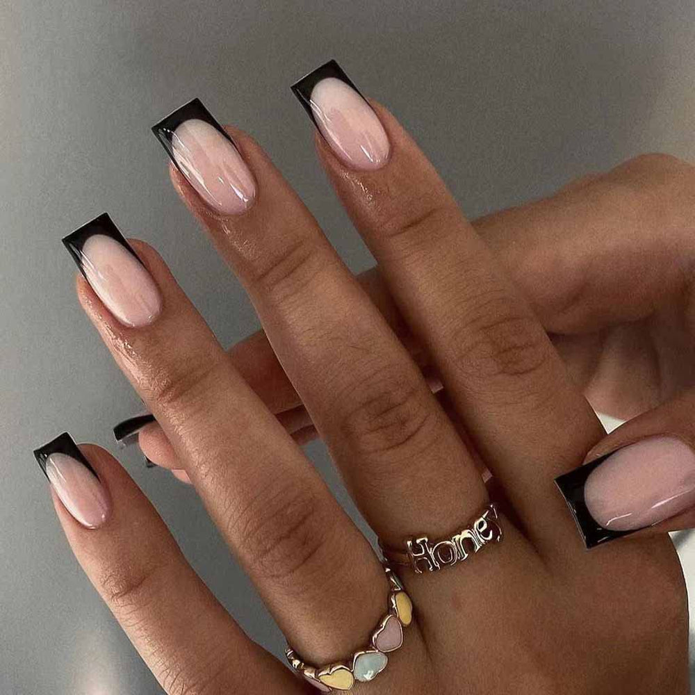 RikView front packaging showing 24-piece black and nude press-on nails for quick style