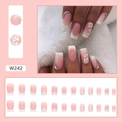 Rilafuvu close-up of flower detail on pink French tips highlighting design