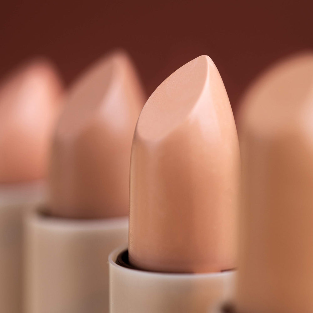 Rimmel close-up covering a blemish to show precise, buildable concealment