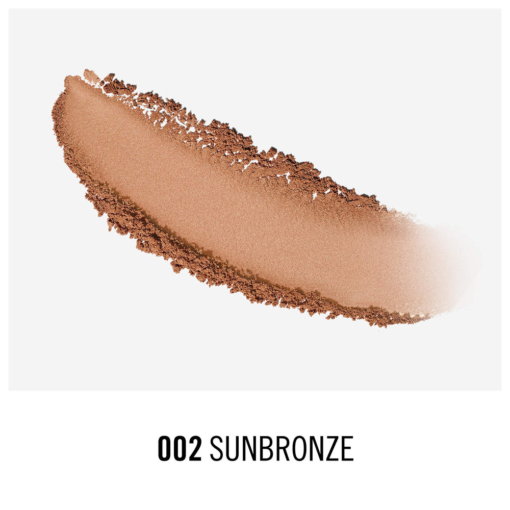 Rimmel swatch on arm displaying Sunbronze warmth and blendable finish
