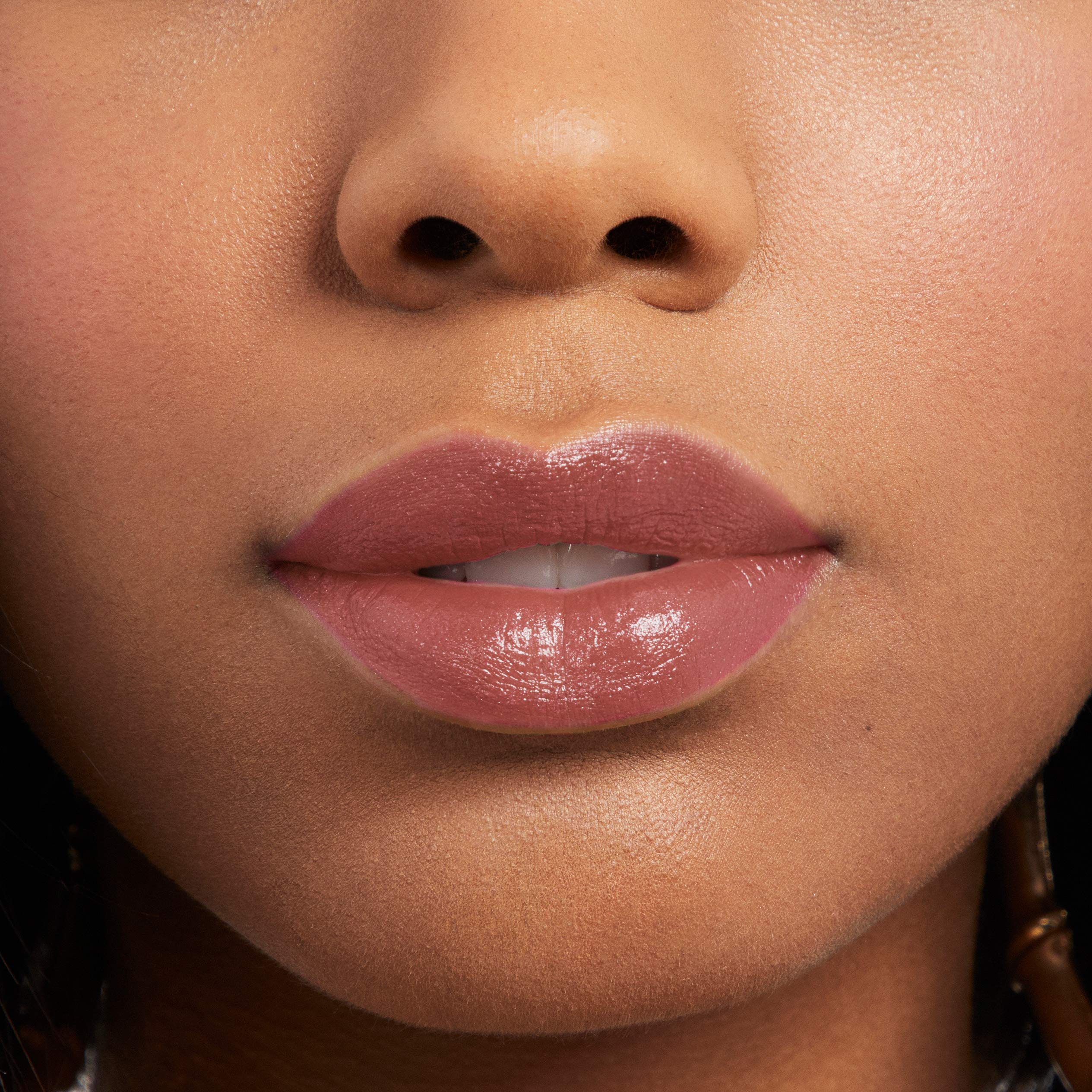 Rimmel Provocalips worn in an evening setting showing wearable bold berry color
