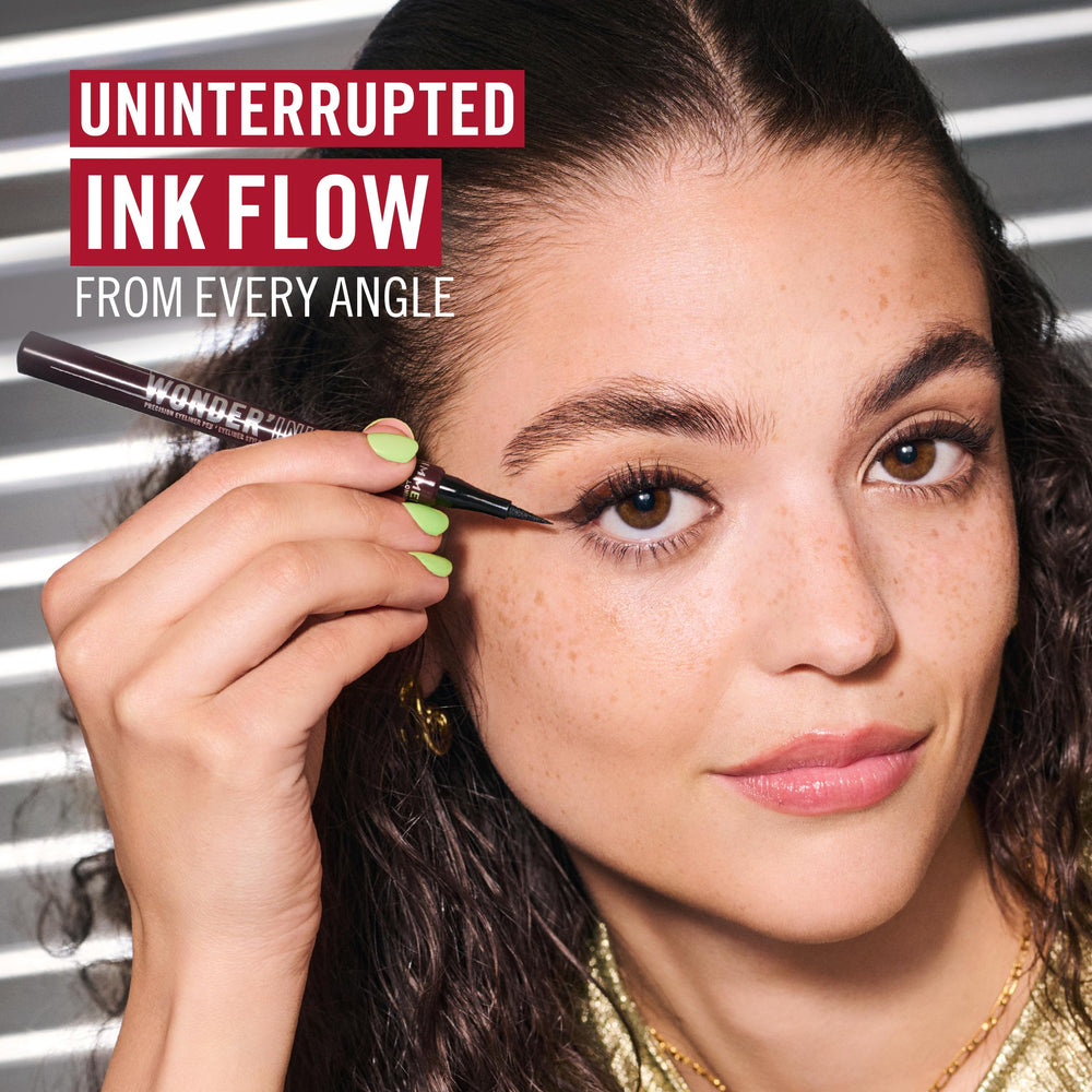 Rimmel applying liner on eye demonstrating easy wing creation benefit